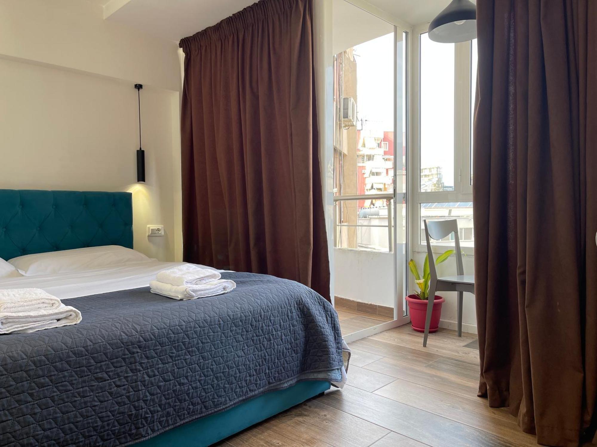 Boutique Central Studio Apartments Тирана Экстерьер фото